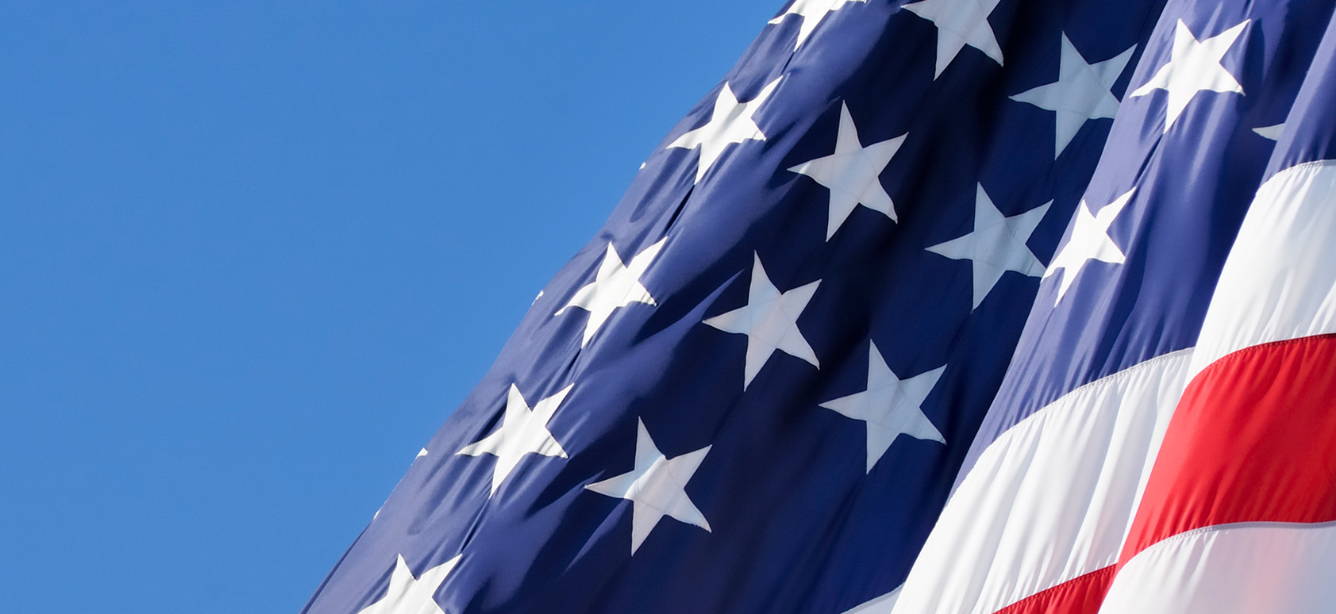 american flag waving in sky